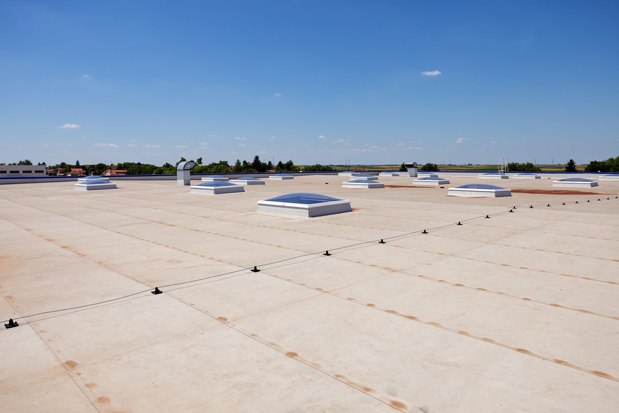 Professional team conducting expert commercial roof inspection service