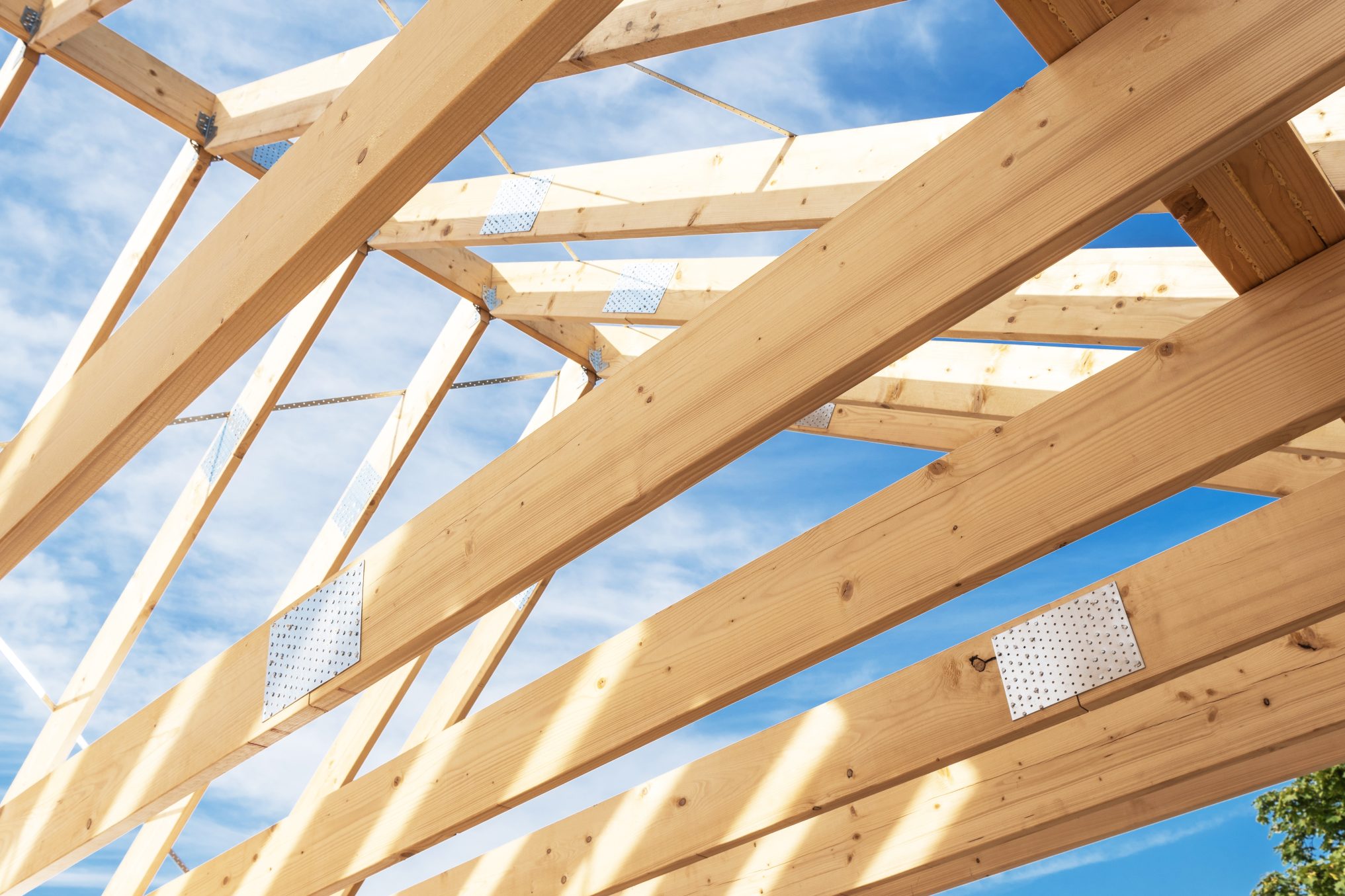 Professional roof installation in progress on a residential home