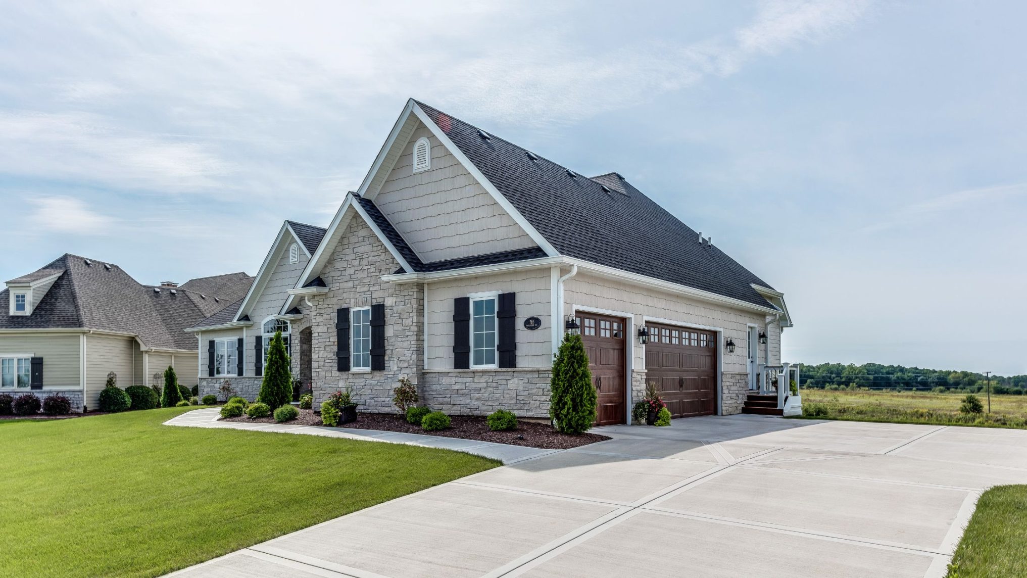 Professional roofing services team inspecting a residential roof