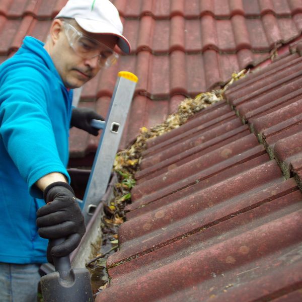 Roofing installation team at work on residential property