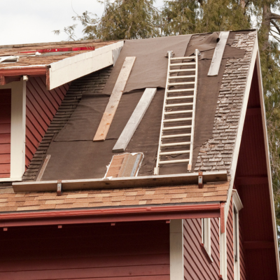 Quick Roofing logo showcasing expert roofing services and solutions